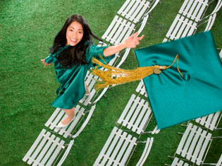 Cap Tossing Graduate Image